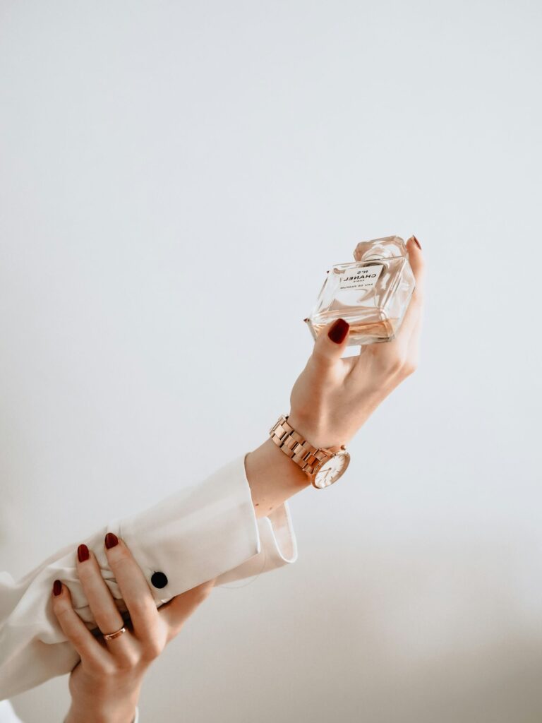 Lady with perfume bottle in hand